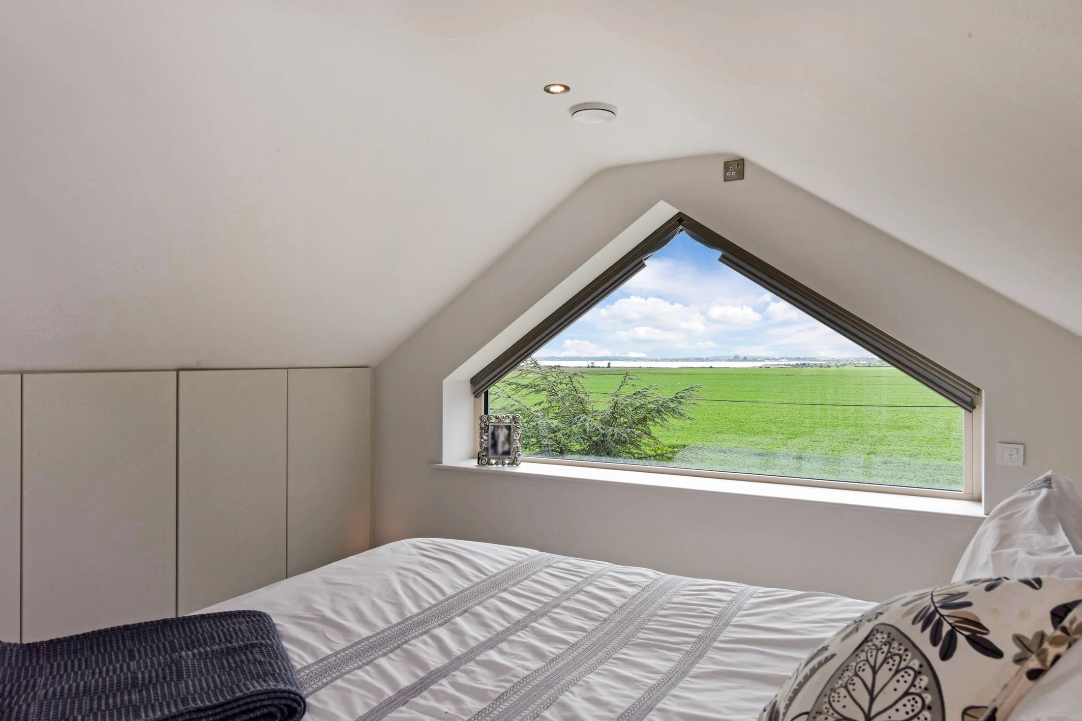 A Highclear bedroom with views towards the surrounding countryside