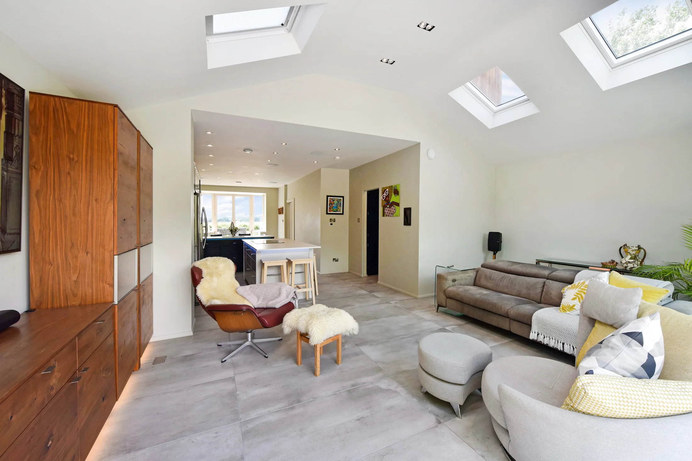 The wide living space at Highclear, filled with natural light